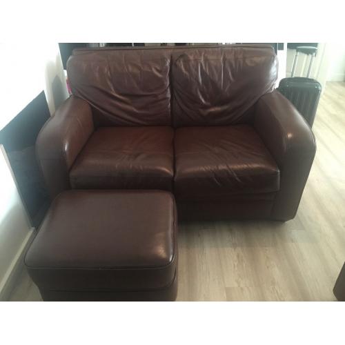 Two brown leather sofas and foot stall for sale