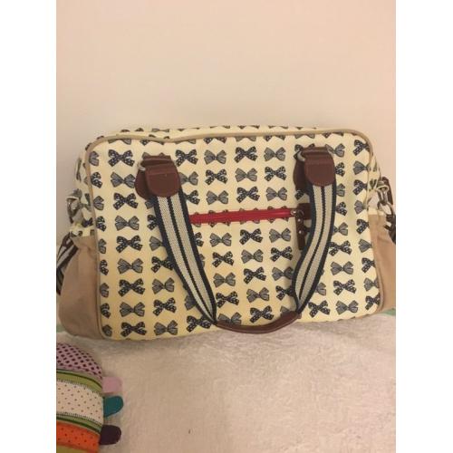 Pink lining nappy change bag