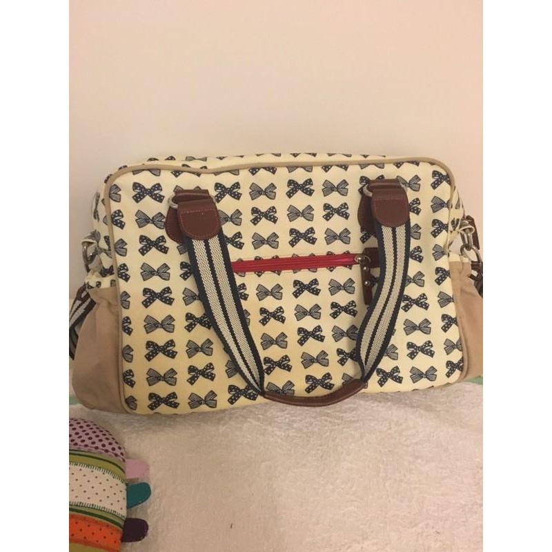 Pink lining nappy change bag