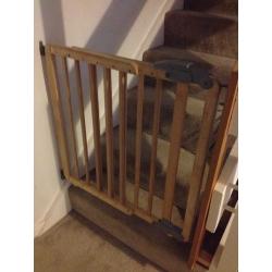 Mama's and Papa's adjustable locking stair gates.