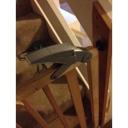 Mama's and Papa's adjustable locking stair gates.