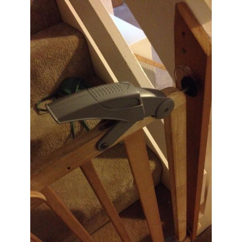 Mama's and Papa's adjustable locking stair gates.