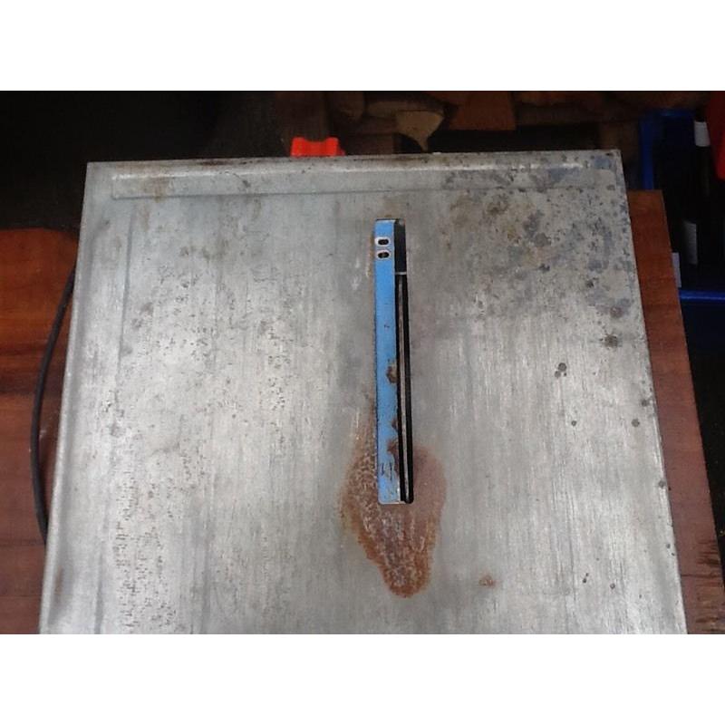 Electric tile cutter.
