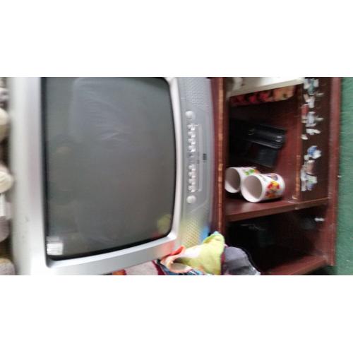 silver tv with dvv player