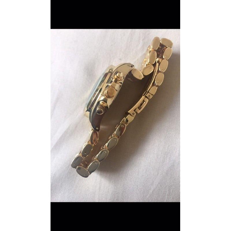 Michael kors gold with black dial watch
