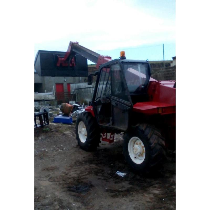 Manitou forklift with long forks and bucket for sale