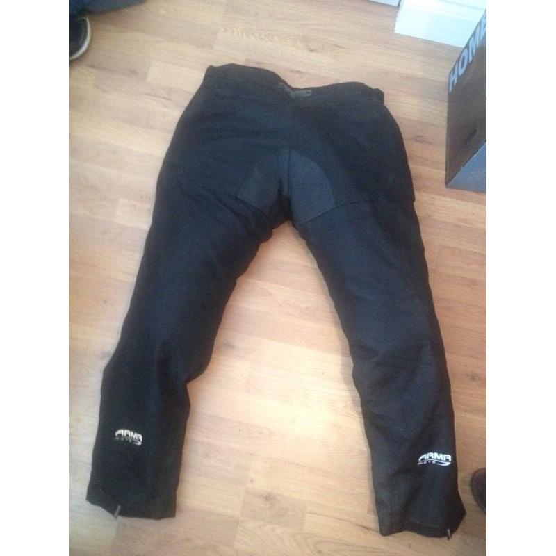 Armr motorcycle trousers size 3XL that's 49-51 inches with knee pad protector.