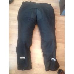 Armr motorcycle trousers size 3XL that's 49-51 inches with knee pad protector.