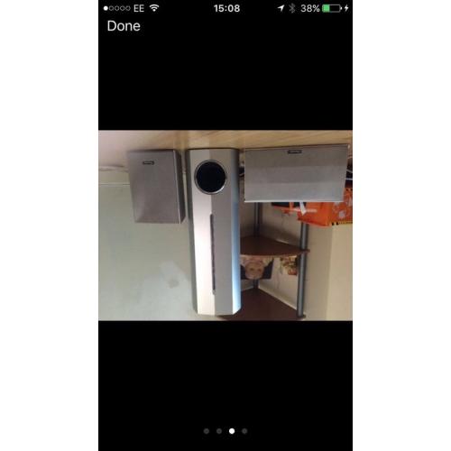 Silver pioneer surround sound system with subwoofer.