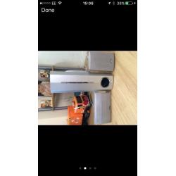 Silver pioneer surround sound system with subwoofer.
