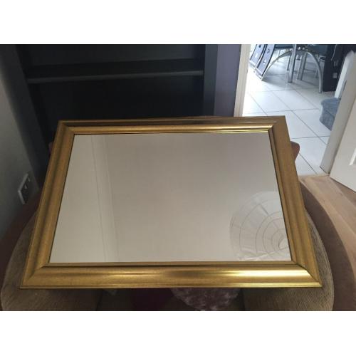 Large gold framed mirror