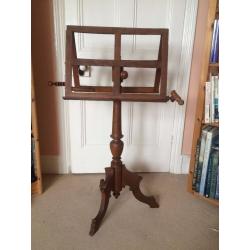 Early Victorian music stand in wood with candle holders. Possibly oak. Extendable to 6ft. [183cm]