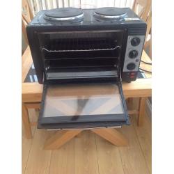 Table top oven and grill with two hot plates