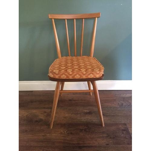 Vintage Original blue label 391 Ercol chair complete with cushion.