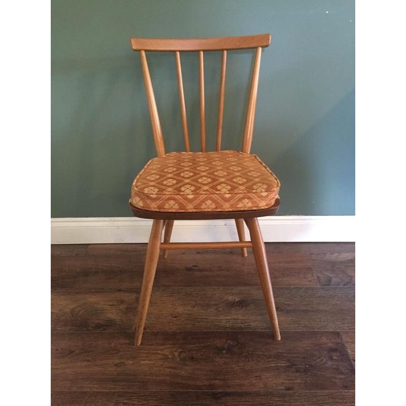 Vintage Original blue label 391 Ercol chair complete with cushion.