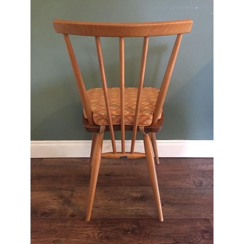 Vintage Original blue label 391 Ercol chair complete with cushion.