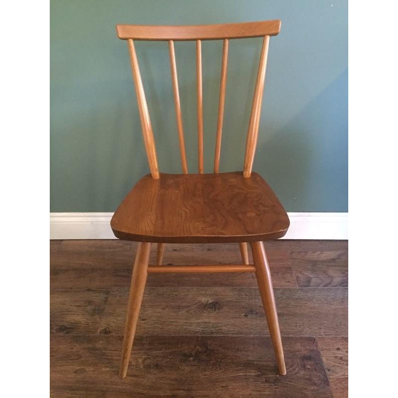 Vintage Original blue label 391 Ercol chair complete with cushion.