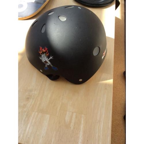 Monster skate board with helmet, knee and elbow pads plus carry case