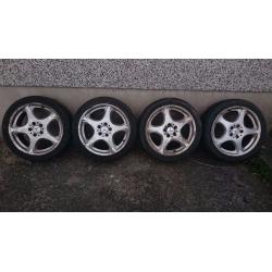 Four 18 x 8J Alloy wheels