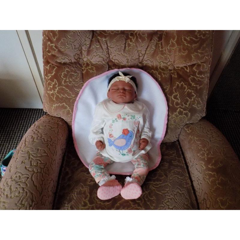 Ethnic reborn baby doll 19" in length like new