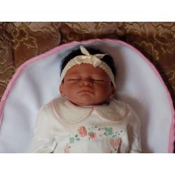 Ethnic reborn baby doll 19" in length like new