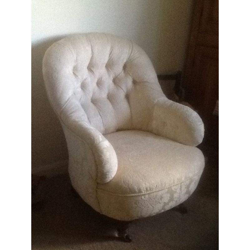 A lovely Victorian Button Back Chair newly upholstered in Cream Fabric.