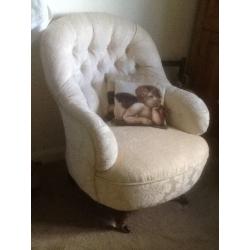 A lovely Victorian Button Back Chair newly upholstered in Cream Fabric.