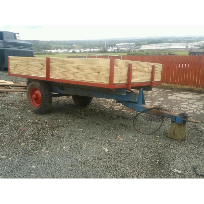 Massey ferguson tractor tipping trailer with new metal and wood
