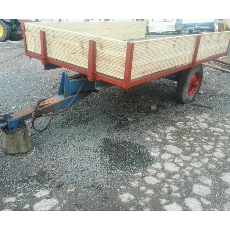 Massey ferguson tractor tipping trailer with new metal and wood