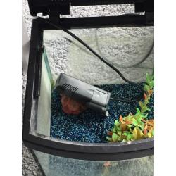 Fish tank, pump and pebbles.