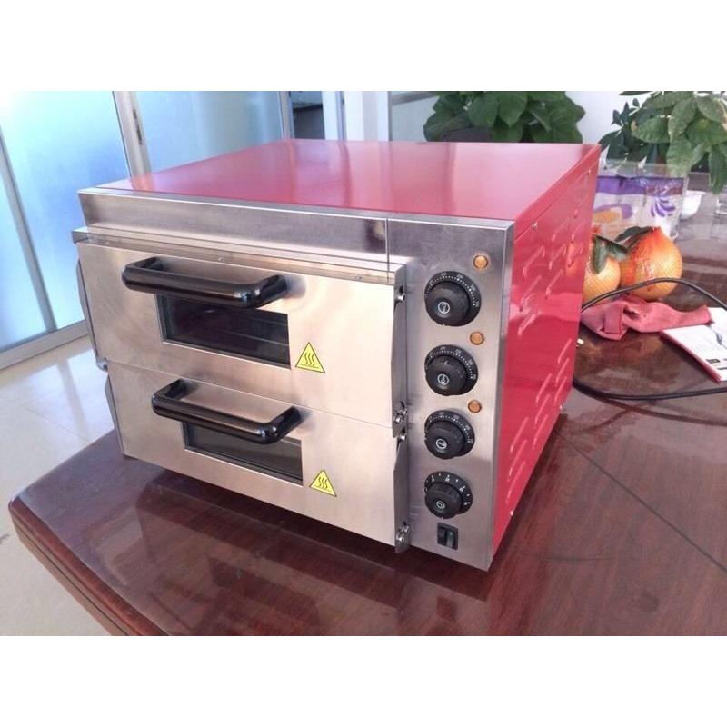 Double Pizza oven for sale brand new in good size