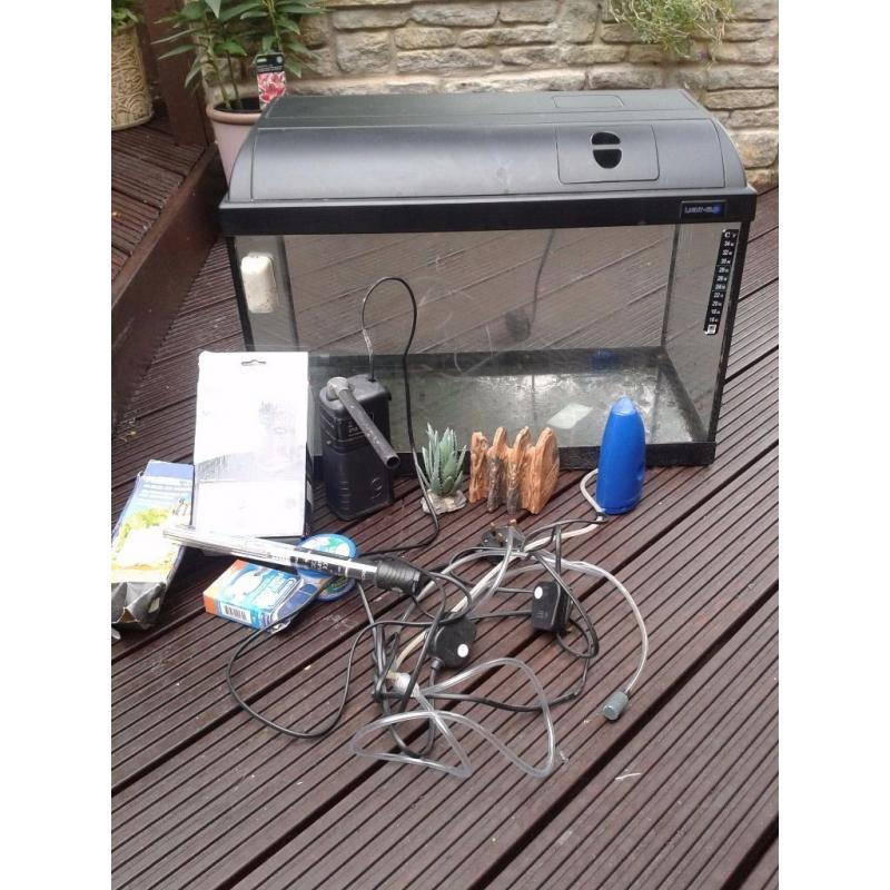 Aquarium, hood & lighting incs heater, filter, oxygen aerator, decorative stone/plant spare food