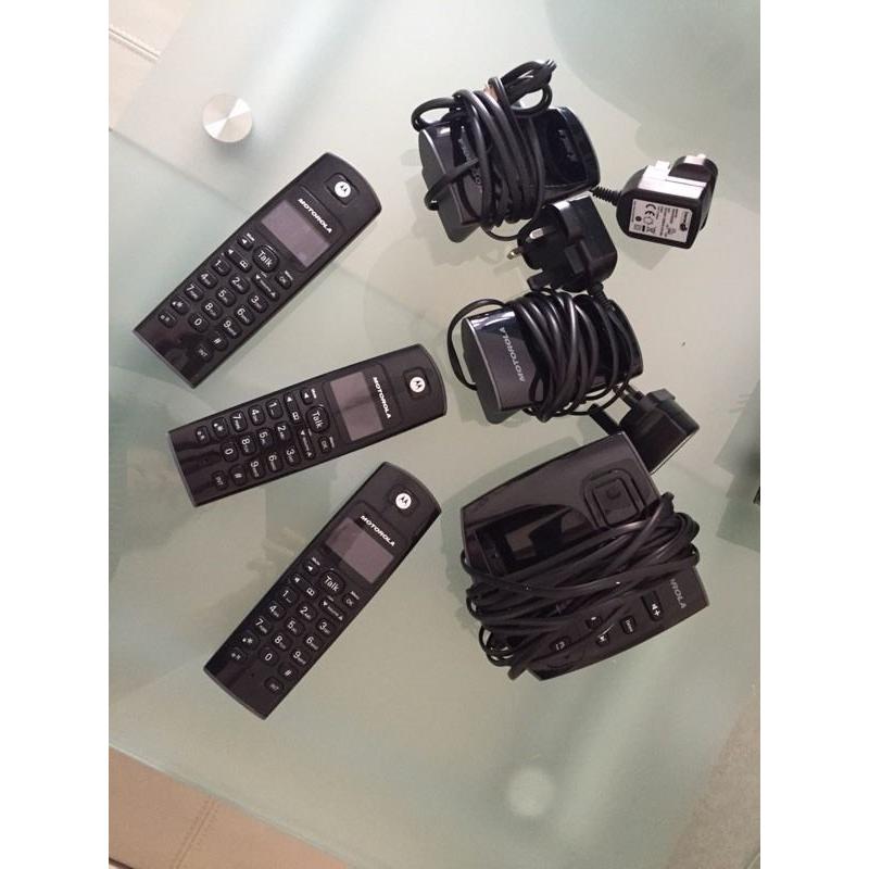 Triple home telephone set with answering machine