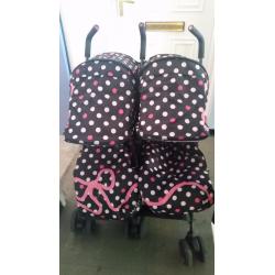 Cossatto double buggy complete with matching cosi toes