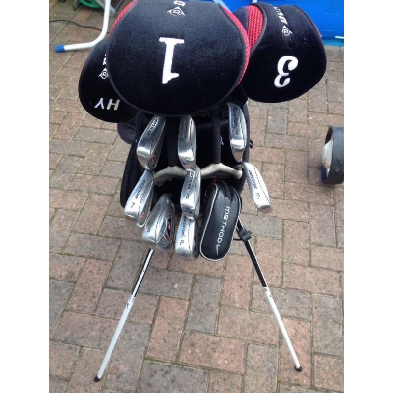 Set of Dunlop tour golf clubs with Nike method putter, Nike bag-golf trolley.