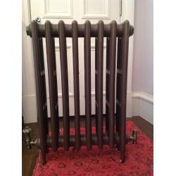 Cast iron 4 column radiator.