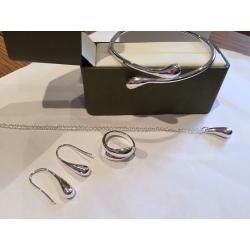 Brand new Silver bracelet, pendant, chain, ring and earrings