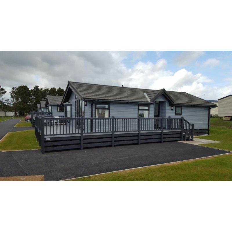-GREAT INVESTMENT OPPORTUNITY- LUXURY LODGE 35x20 WITH GLASS DECKING AT SOUTHERNESS