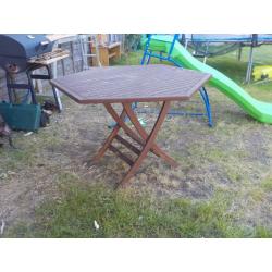 Large Wooden Garden Table - needs restaining - folds down - Collect PE27 asap