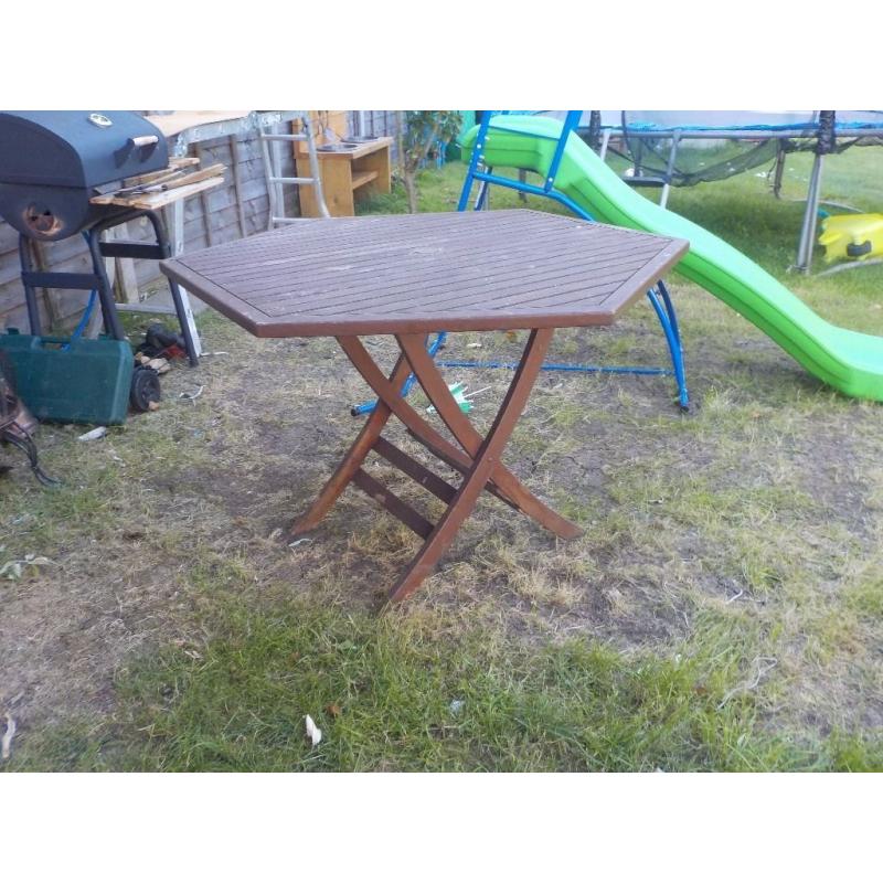 Large Wooden Garden Table - needs restaining - folds down - Collect PE27 asap