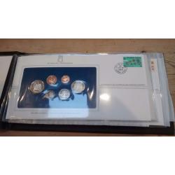 First day of issue presentation set of the Solomon Islands, coins and notes