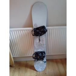 Burton Lux ladies snowboard and K2 Tryst bindings. 143cm