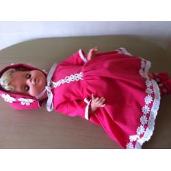 Collectors doll in lovely bright pink clothes bonnet and shoes