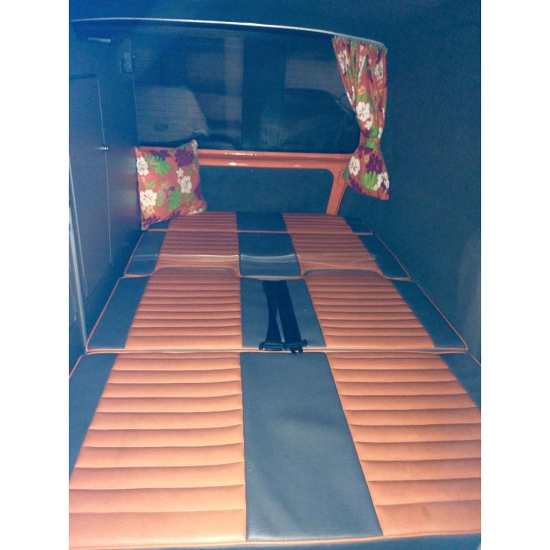 Groovy bright orange campervan with loads of extras, ideal for city living and weekend adventures