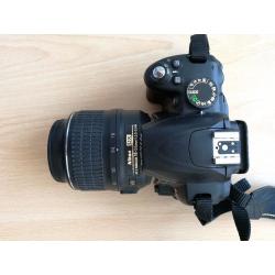 NIKON D3000 with lens and flash