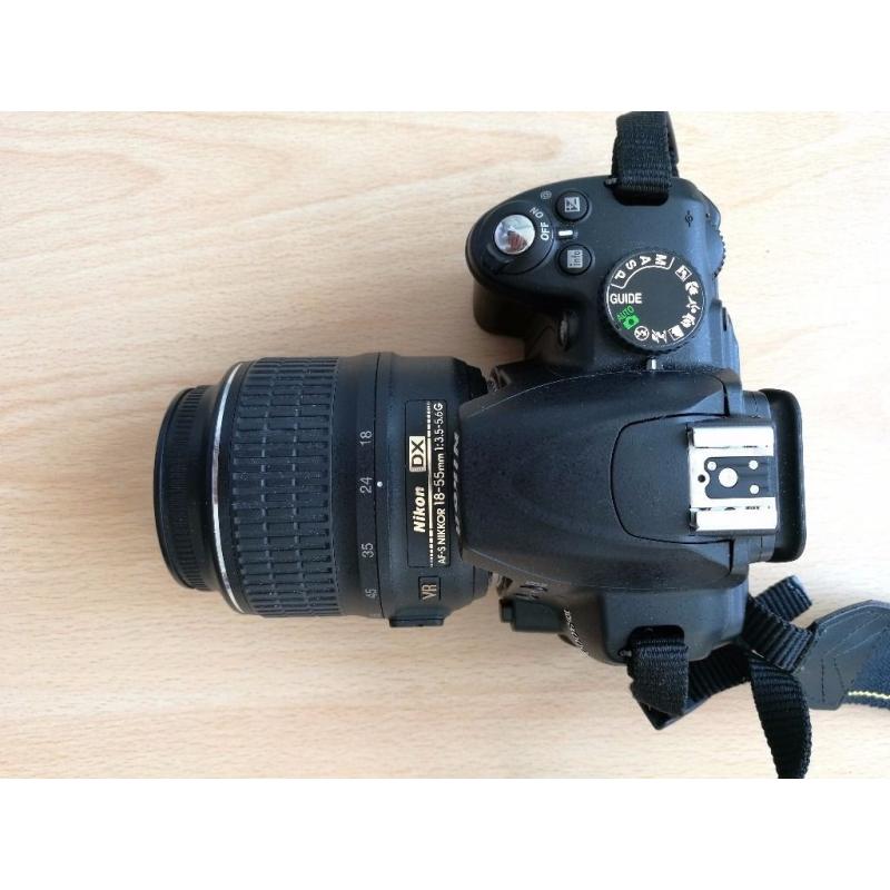 NIKON D3000 with lens and flash