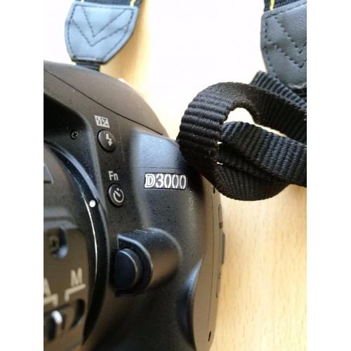 NIKON D3000 with lens and flash