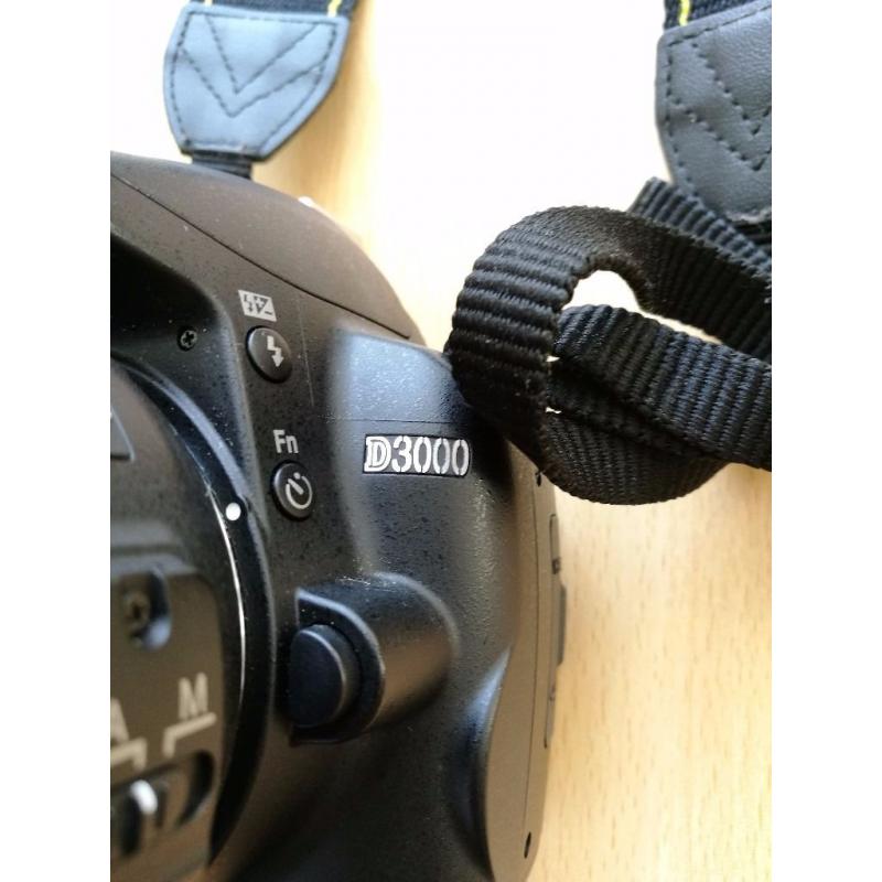 NIKON D3000 with lens and flash