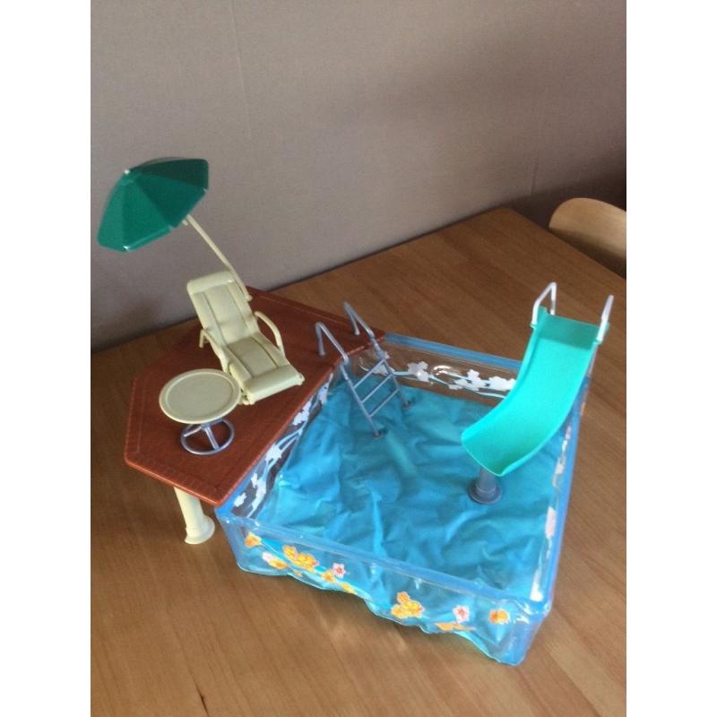 Barbie type doll pool set.