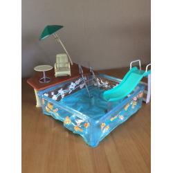 Barbie type doll pool set.